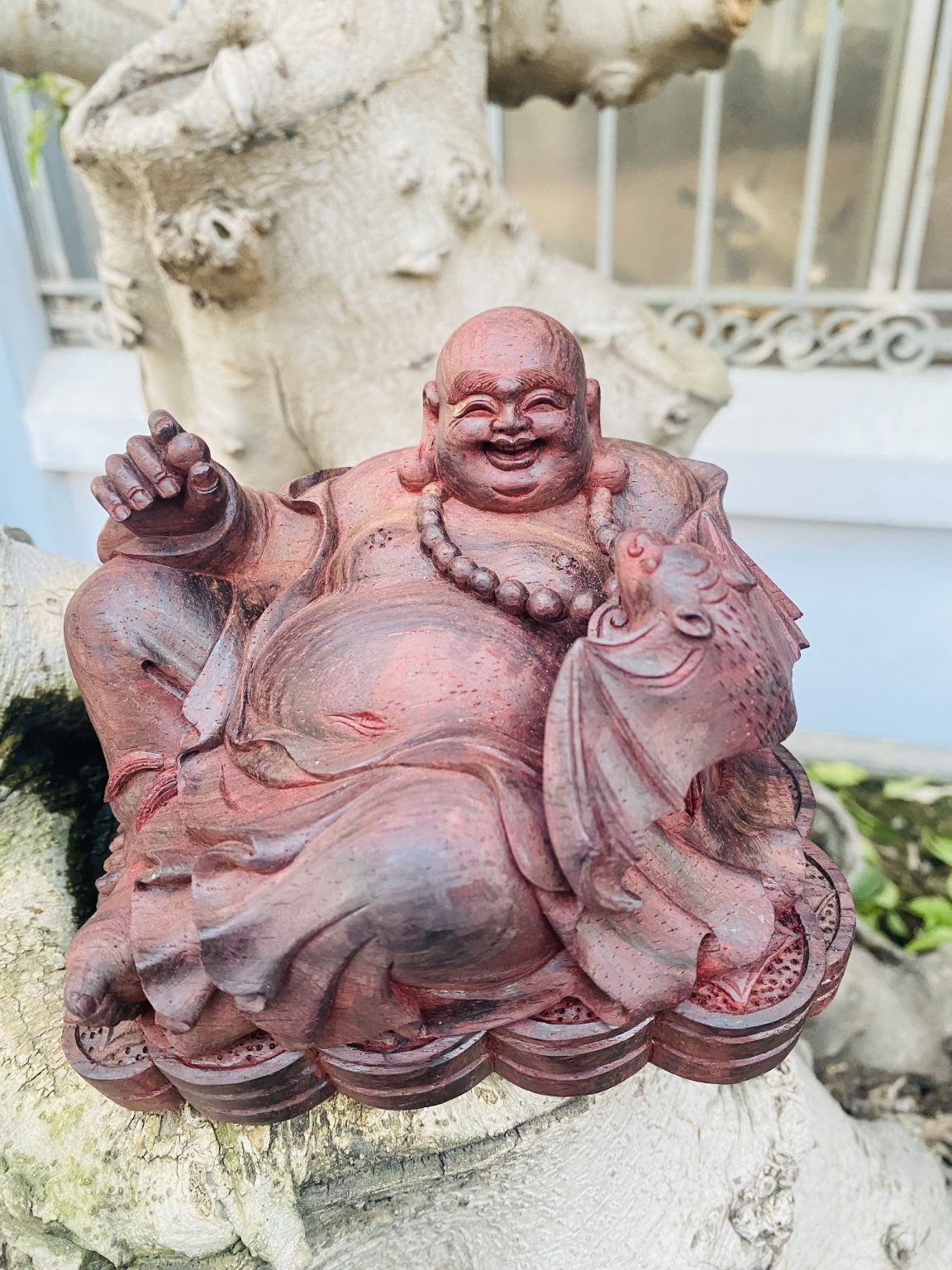 Phật Di Lạc Dơi để xe ô tô